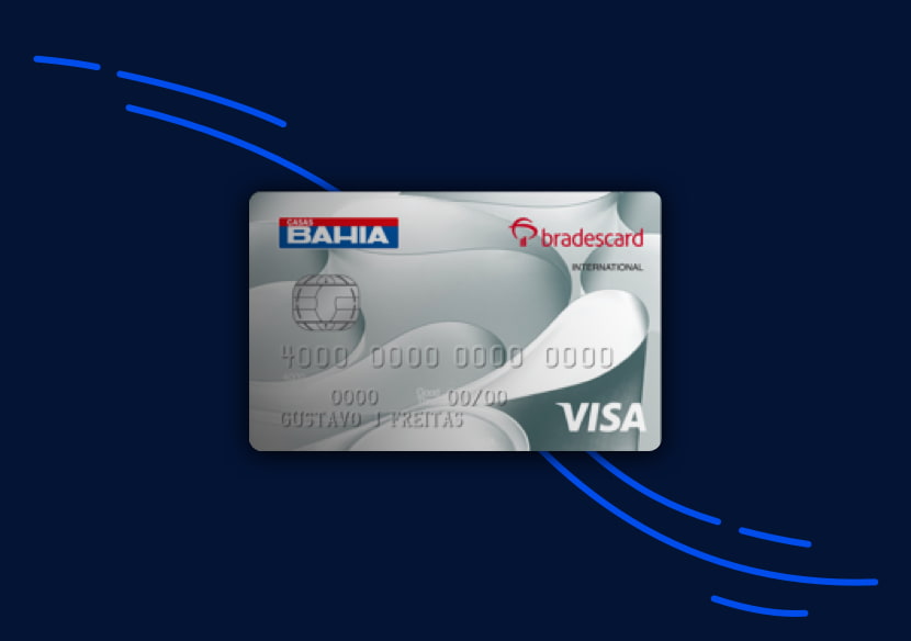 Cartão de crédito Casas Bahia com design prata em fundo azul.