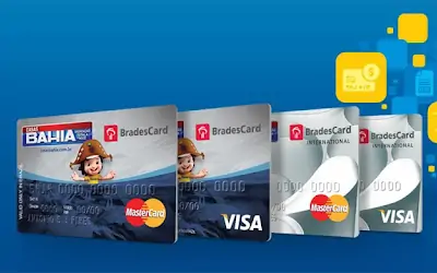 4 Cartões de crédito Casas Bahia enfileirados em fundo azul.